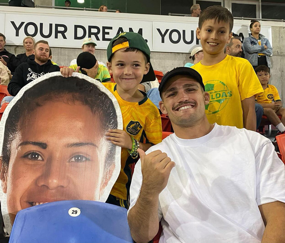 Supporter holding a Sports Head