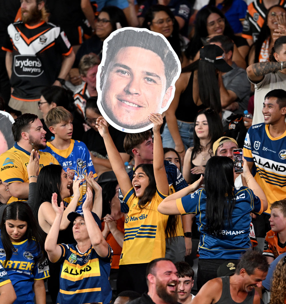 Supporter holding a Sports Head