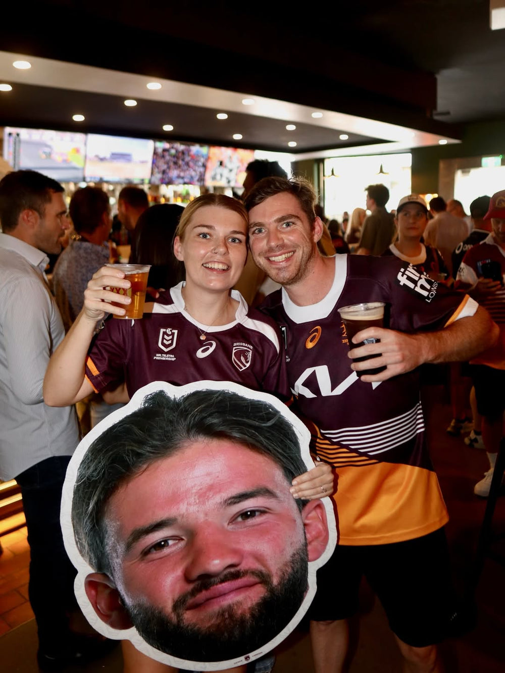 Fans celebrating with Sports Heads
