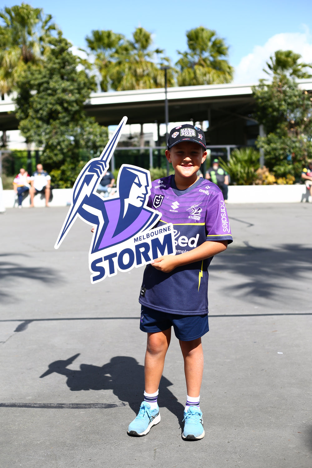 Supporter holding a Sports Head