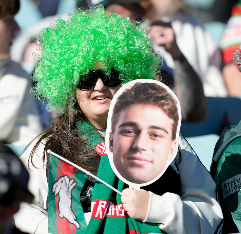 Supporter holding a Sports Head
